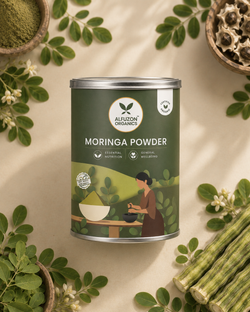 Alfuzon Organics Moringa Leaf Powder: tin with moringa leaves, powder and stems
